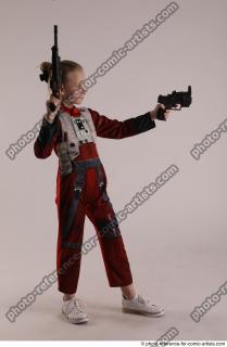 DENISA WITH TWO GUNS